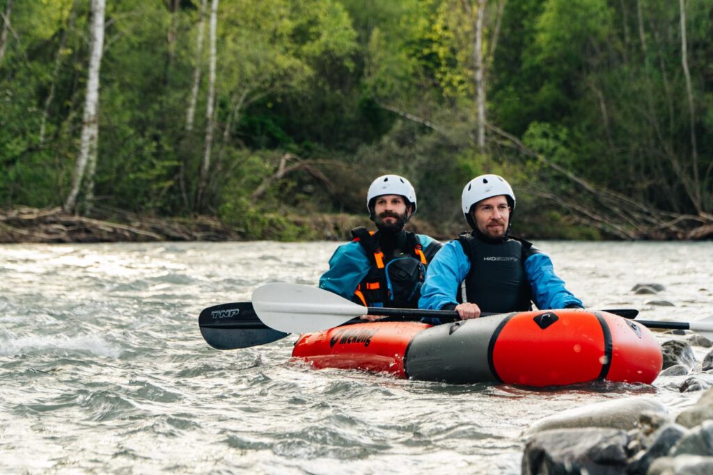 Paddling a river in two seater packraft